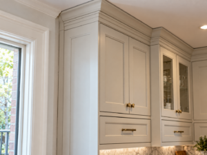 A luxurious primary bathroom remodel in a Huntingdon Valley home featuring a large glass-enclosed wet room, a freestanding soaking tub, and a custom floating double vanity.